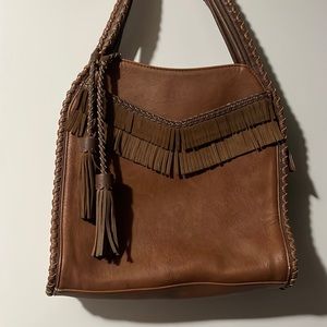 Big leather fringed boho shoulder bag w leather tassel, fabric inside, preowned.